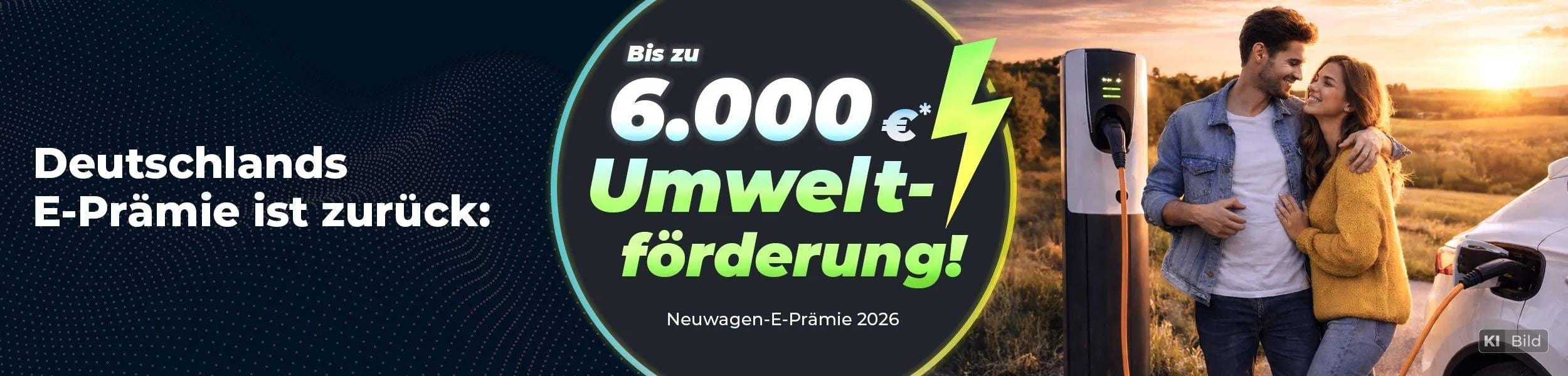 Werbebanner zur Neuwagen-E-Praemie 2026 mit dem Hinweis «Deutschlands E-Praemie ist zurueck» und einer Umweltfoerderung von bis zu 6'000 Euro. Rechts stehen ein Paar neben einer Ladestation waehrend ein Elektroauto geladen wird. Unten links ist ein Button mit der Aufschrift «Jetzt Angebot sichern» sichtbar.